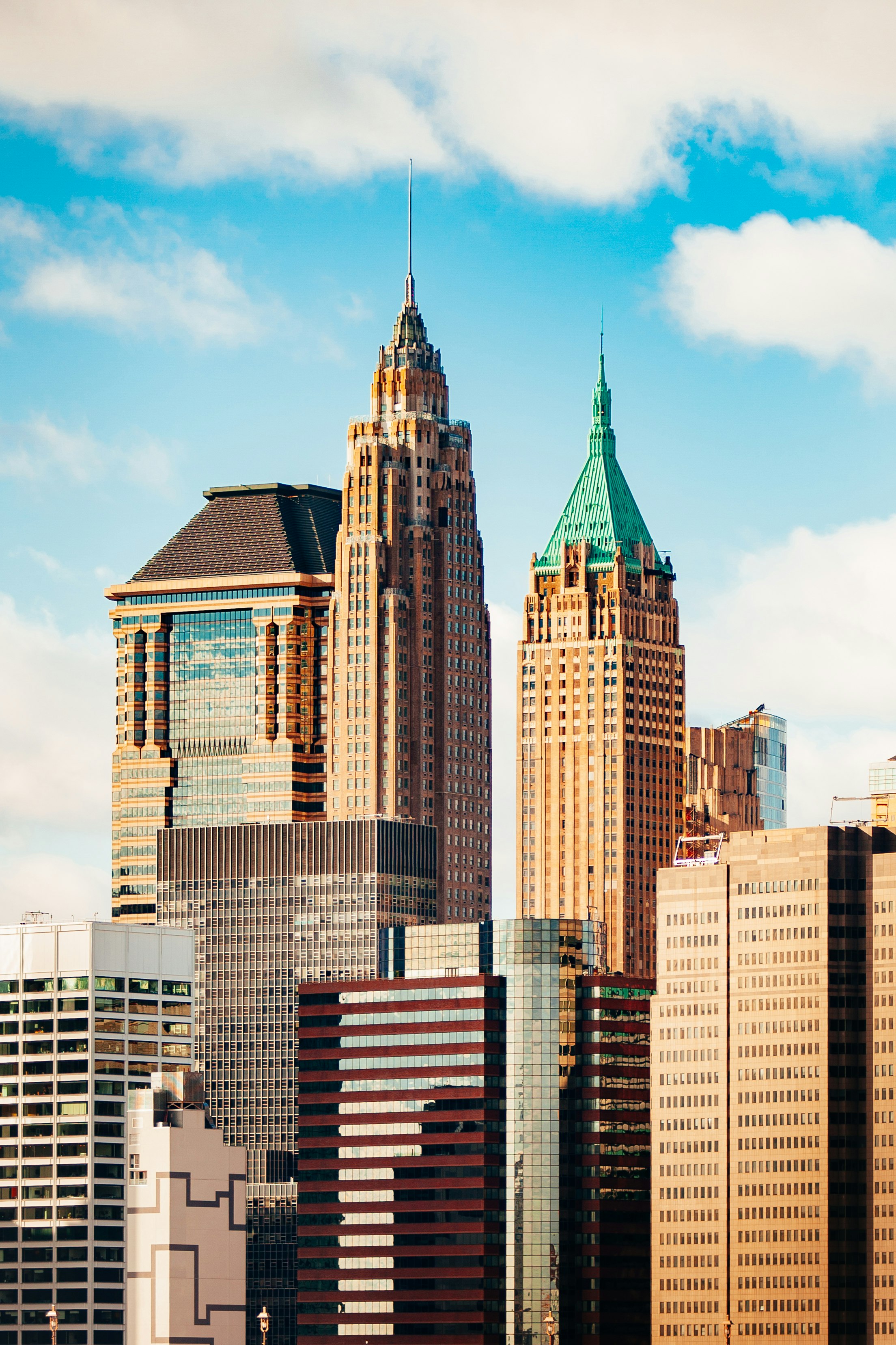 skyscrapers under cloudy sky